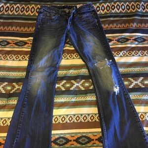 Levi’s 518 Super Low Rise distressed Jeans